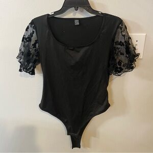 one piece bodysuit
sheer floral sleeves
brand shein
size large